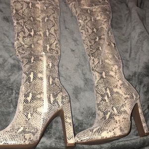 Over the knee snake print boots